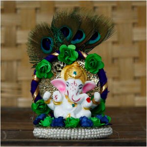 CraftIndia Lord Ganesha Idol on Decorative Handcrafted Floral Plate with Peacock Feather for Home and Car